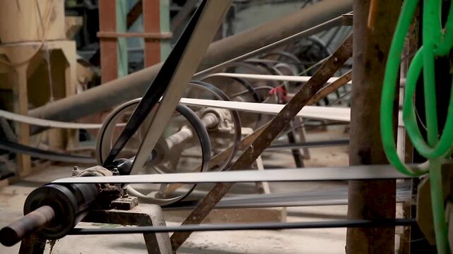 Old technology transmission, historical belt transmission via shafts and belts, old rice mill, Mekong Delta, Vietnam, Asia