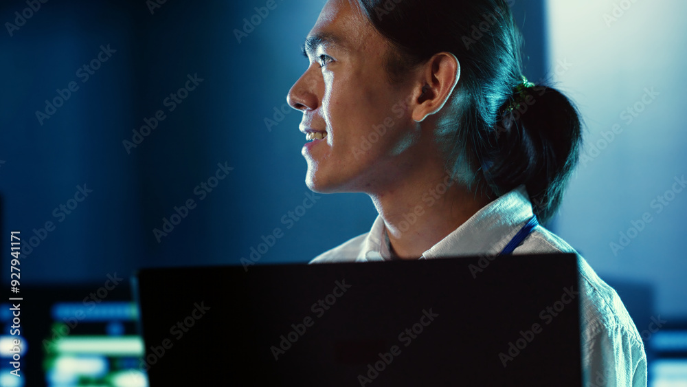Poster close up shot of happy employee wandering around data center infrastructure providing processing res