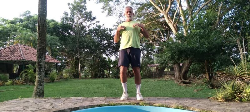 50 year old man doing basic calisthenics exercises