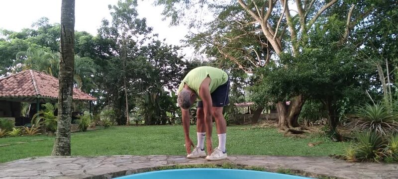 50 year old man doing basic calisthenics exercises