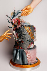 An elaborate cake with detailed decorations, ideal for wedding, celebration, or gourmet...
