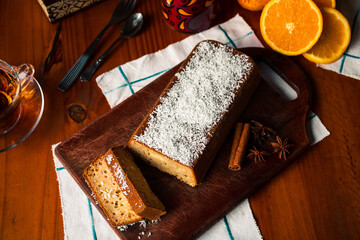 coffee table with coconut and orange cake