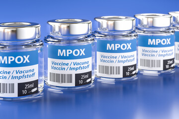 Vials of vaccine against Mpox: The word vaccination in English, Spanish, French and German on the label