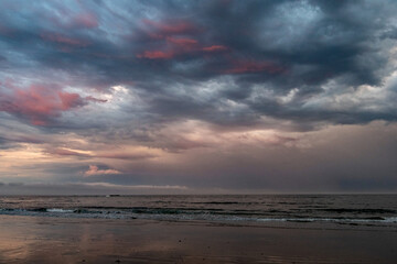 Stormy sunset on the beach