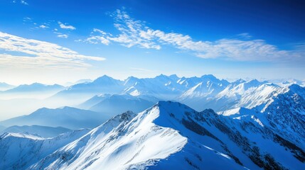 Fototapeta premium Breathtaking mountain landscape showcasing snowy peaks and clear blue skies, perfect for nature and travel themes.