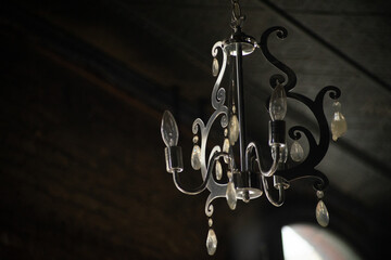 Classic chandelier, retro interior background with soft focus 
