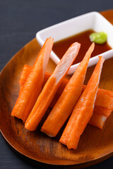 Crab sticks on wooden plate eating with wasabi and sauce © nungning20