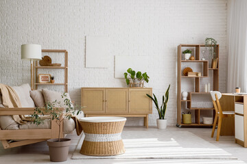 Interior of light living room with white sofa and coffee table