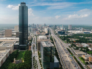 Cityscape buildings of Westside in Uptown Houston and Insterstate 610 Freeway, Texas, United States of America.