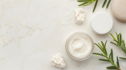 Natural Skincare Products on Marble Background with Fresh Greenery and Cream Jar
