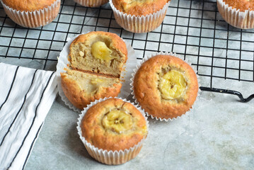 Airy banana muffins on a gray background