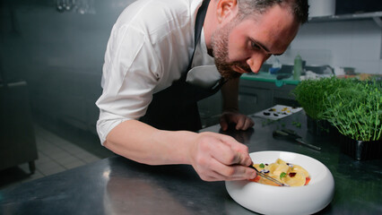 Chef Concentration For The Final Step Of Dish Composition