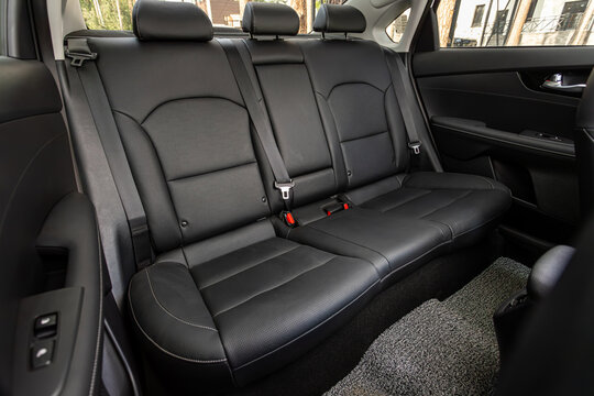 Novosibirsk, Russia -  August 10, 2024:  Kia K3, Car interior, part of back  black     seats .