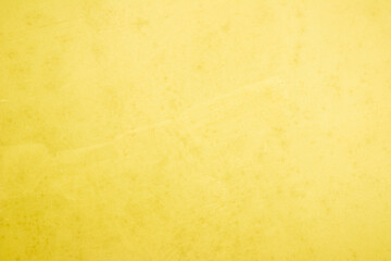 Yellow concrete stone texture for background in summer wallpaper. Cement and sand wall of tone vintage minimal. Concrete abstract wall of light yellow color, cement texture white blank for home decor.