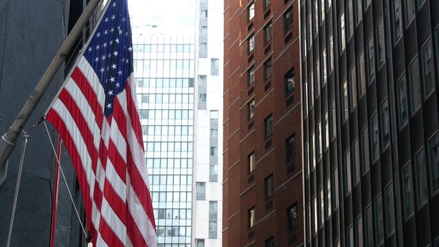 New York City Lower Manhattan, Downtown Financial District street architecture, United States. High-rise skyscrapers, residential, office buildings, american flag. Real estate, USA realty. FiDi towers