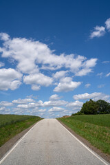 Road in the countryside with a blue sky