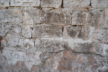 Old barn wall with stones 