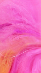 Gradient paint. Shiny liquid. Defocused pink orange color flowing translucent drop emulsion sparkling particles beauty ink gel texture abstract art background.