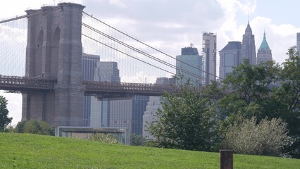 Brooklyn Bridge, New York City Manhattan downtown skyline architecture, financial district...