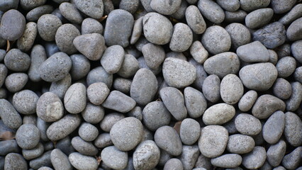 Pebbles in the garden, pebble stone texture background. Natural pattern.