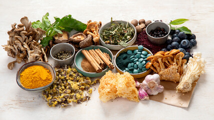 Adaptogen healthy food. Herb and spice collection on light background