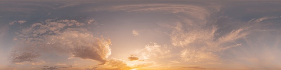 360 panorama of glowing sunset sky with bright Cirrus clouds. Seamless hdr spherical 360 panorama. Sky dome in 3D visualization, sky replacement for aerial drone panoramas. Weather and climate change