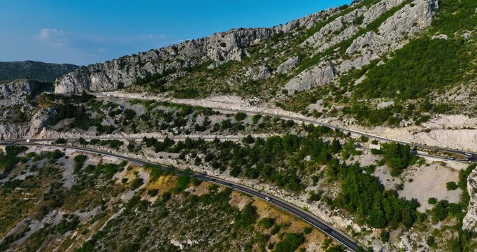 Aerial view away from a winding road on the Makarska riviera, in sunny Croatia