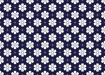 White symbol floral on dark blue background, ethnic fabric seamless pattern design for cloth, carpet, batik, wallpaper, wrapping etc.