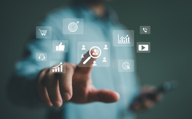 Hand touch the sign and icon of Digital marketing internet advertising and sales increase business technology concept, online marketing, E-business, E-commerce, Business online.