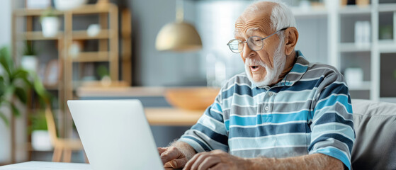 Obraz premium Elderly man engaged with laptop, vibrant interior filled with plants, expressions of surprise, casual striped shirt, modern home environment, technology usage at an older age