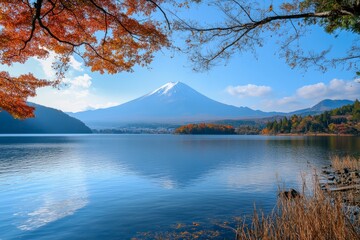 Colorful autumn fall foliage at Kawaguchi Lake with mount Fuji as the background in Japan
