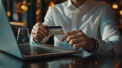 Man Using Credit Card for Online Purchase