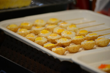 close up of a tray of Quail Egg, Thailand, Market, Yummy, Street Food, Cheap, Fast Food, Salty
