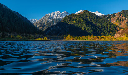 Picturesque mountain lake Issyk in the outskirts of the Kazakh city of Almaty on an autumn morning