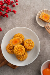 Cantonese moon cake for Mid-Autumn Festival food mooncake on gray table background.