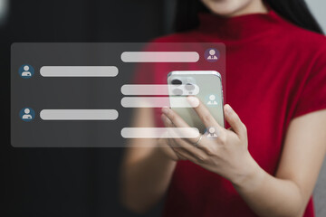 woman uses mobile phone to chat with friends during her free time.