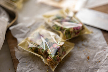 Snowflake Crisp (Milk Nougat Bites)wooden background