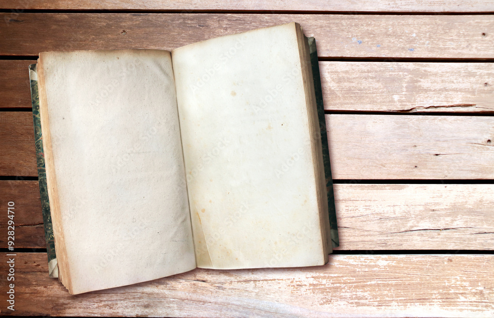 Wall mural old book with blank pages on vintage boards. vintage opened book with empty page on wood planks. moc