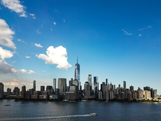 Fototapeta premium NYC aerial view. New York City skyline, cityscape of Manhattan in USA. New York City NYC Manhattan Downtown Skyline, viewed from Jersey City, New Jersey, USA.