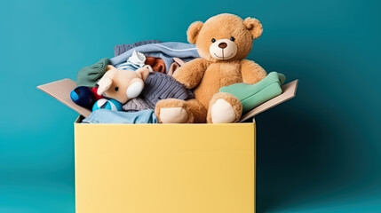 A Cardboard Box with donations for children with school supplies and toys, charity and donation concept