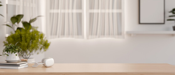A space for displaying products on a wooden tabletop in a minimalist white room.
