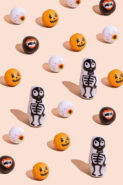 Halloween themed candy against beige background