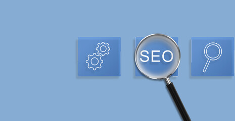 Magnifying glass focus on Search Engine Optimization (SEO) concept. Businessman user laptop to...