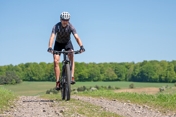 Man on a mountain bike. © Tomasz Warszewski