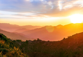 beautiful scenic sunset landscape of a canyon between two mountains