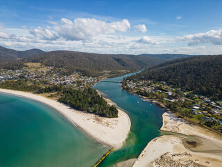Orford, Tasmania: Aerial drone view of the Orford town by the Tasman sea and the Prosser river and bay in Australia.