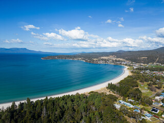 Fototapeta premium Orford, Tasmania: Aerial drone view of the white sand beach in Orford by the Tasman sea and the Prosser bay in Australia.