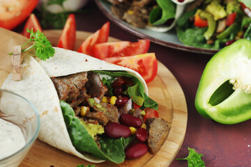 Burrito - typical Texas and Mexican cuisine wrap dish