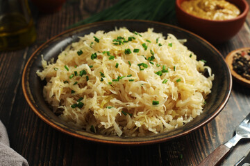 A bowl with traditional German Sauerkraut served in rustic style