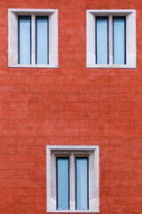 Red wall with windows